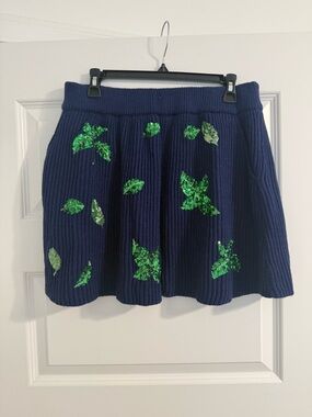 QUEEN OF SPARKLES Navy Blue Knit Skirt with Green Sequin Leaf Accents